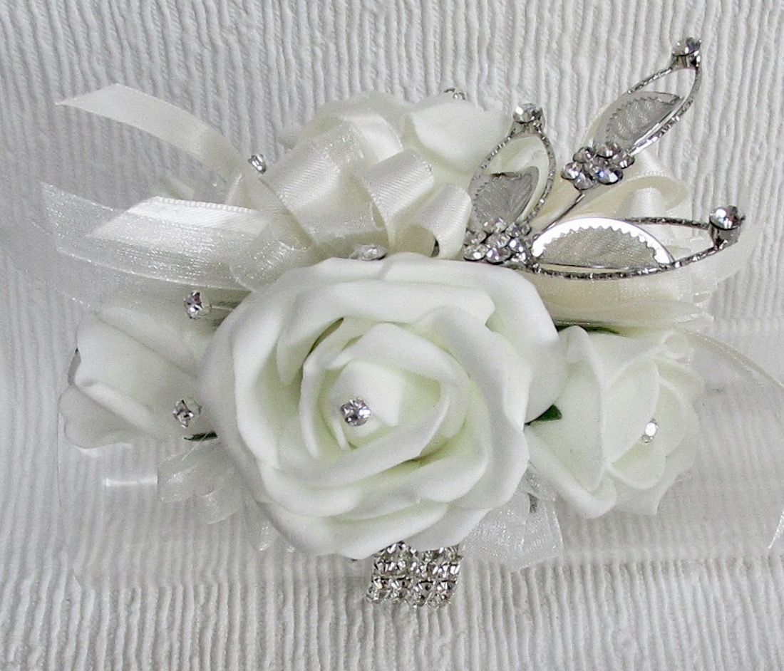 Pale ivory Roses with beautiful silver diamante leaf spray